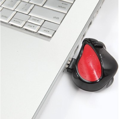 The Swiftmouse offers pen-like comfort and traditional mouse functionality while sitting on top of a laptop's palm rest