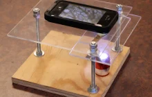 Fitting 'smart' mobile phone with magnifying optics creates 'real' cell phone