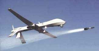 Armed Predator drone firing Hellfire missile (Photo credit: Wikipedia)