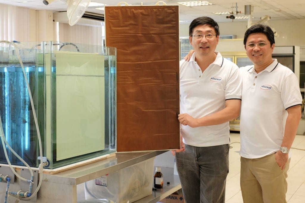 Founder NTU Assoc Prof Darren Sun (left) holding the new Nano Sun membranes, with Managing Director and NTU business professor Wong Ann Chai (right).