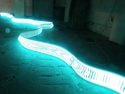 Electroluminescent Light Sheets: Printable Luminous Particles Enable Cost-Effective, Large and Curved Luminous Surfaces