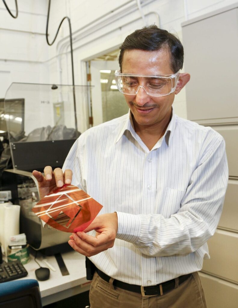 ORNL researchers are experimenting with additive roll-to-roll manufacturing techniques to develop low-cost wireless sensors. ORNL’s Pooran Joshi shows how the process enables electronics components to be printed on flexible plastic substrates.