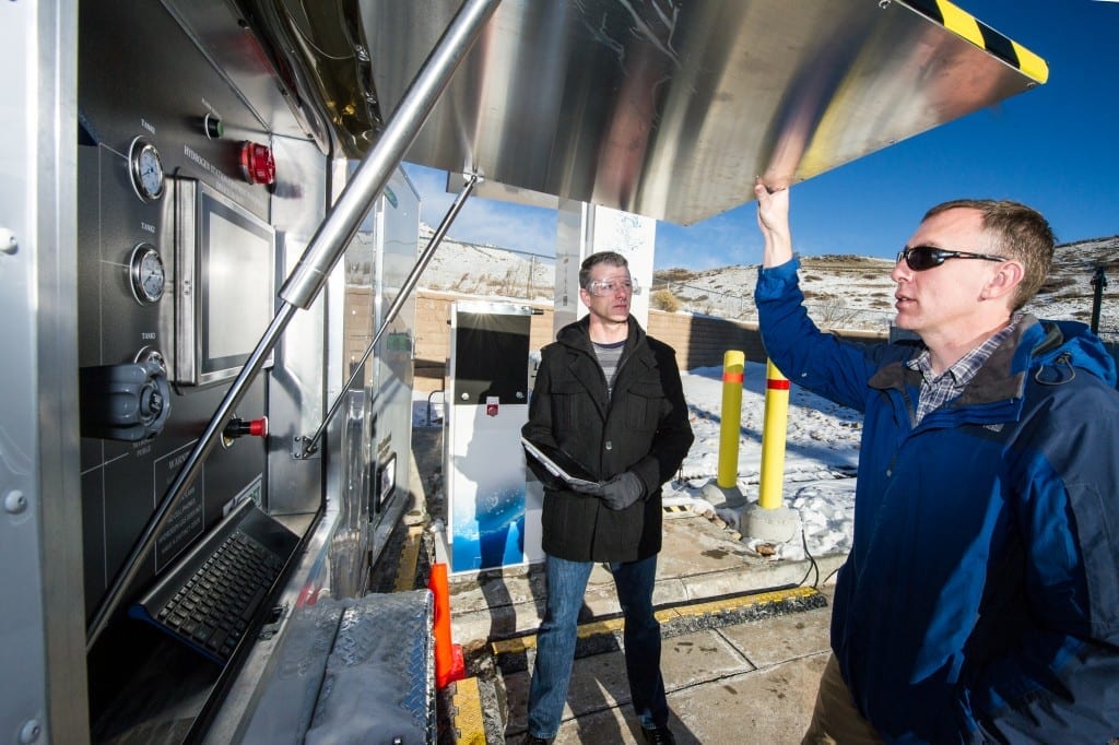 December 1, 2015- L-R, Terry Johnson, Sandia Lab, Project Lead and NREL researcher Chris Ainscough work on the Hydrogen Station Equipment Performance (HyStEP) device at the Energy Systems Integration Lab at NREL in Golden, CO. HyStEP is designed to facilitate the commissioning of hydrogen stations by testing their ability to meet the SAE J2601 fueling protocol. (Photo by Dennis Schroeder / NREL)