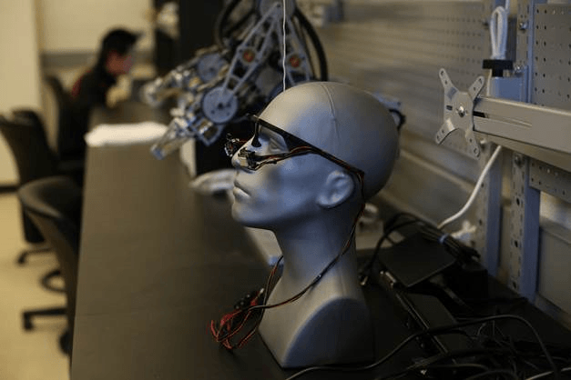 Xiaoli Zhang, an engineer at Colorado School of Mines, is developing a gaze-controlled robotic system that works in three dimensions to enable people with motor impairments to fetch objects using eye movement. Credit: Xiaoli Zhang, Colorado School of Mines