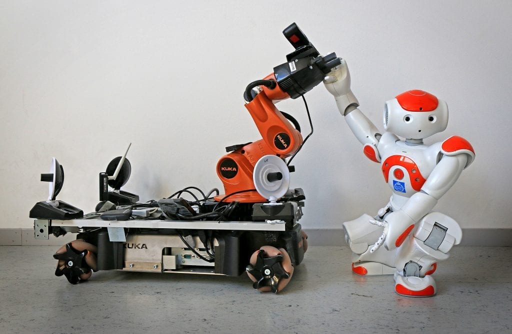 Two off-the-shelf robots were used to demonstrate how robots can pick up each other's signals for assistance, and even set aside their own tasks in order to lend a "hand".
