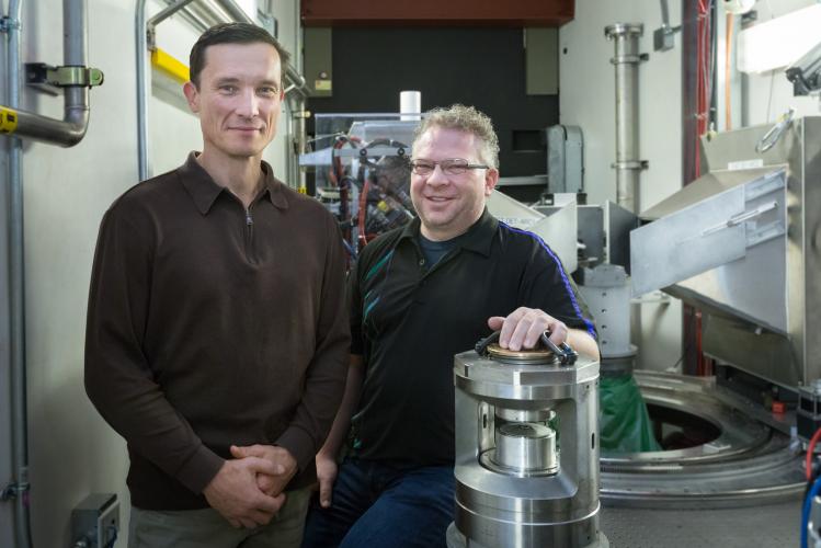 Ilia Ivanov (left) from Oak Ridge National Laboratory’s Center for Nanophase Materials Science, Chris Tulk (right) from ORNL’s Spallation Neutron Source and their collaborators received unexpected results from a neutron scattering experiment at SNS that could open a new pathway for the synthesis of novel materials and also help explain the formation of complex organic structures observed in interstellar space. 