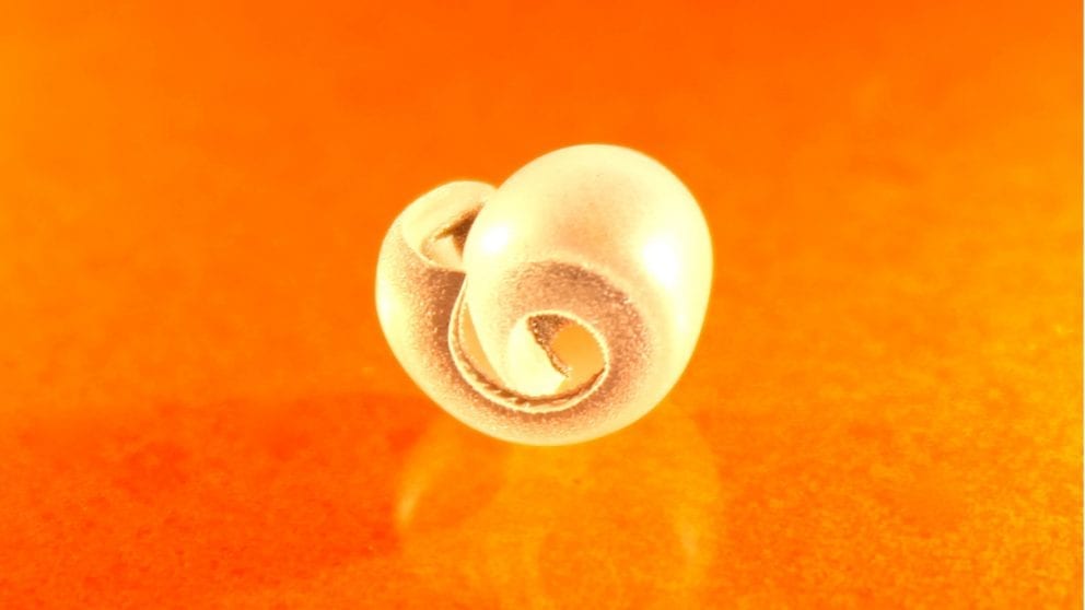 Using light to curve plastics into three-dimensional (3-D) structures, such as spheres, tubes or bowls