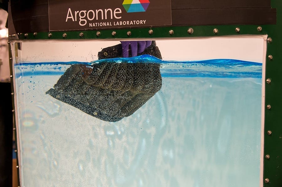 A reusable sponge that soaks up surface and water column oil repeatedly hundreds of times