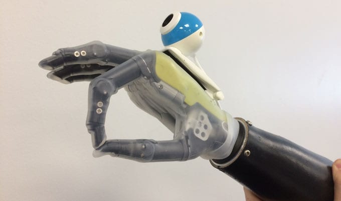 A new prosthetic limb allows the wearer to reach for objects automatically, without thinking – just like a real hand