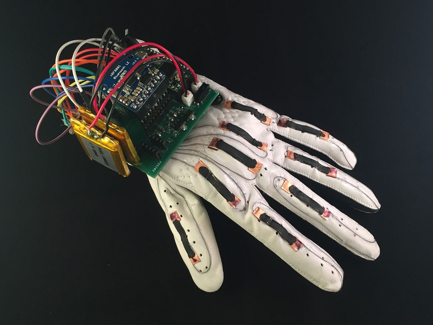 A smart glove wirelessly translates the American Sign Language alphabet into text