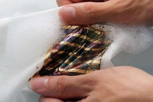 A wearable solar cell can be soaked in water, stretched and compressed