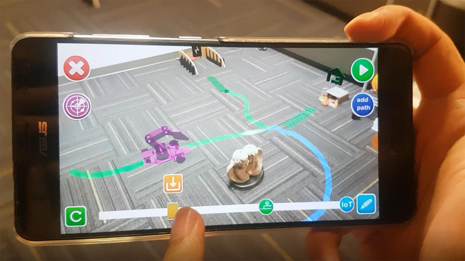 A smartphone app that allows a user to easily program any robot to perform a mundane activity