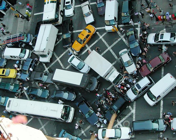 Using connected cars to gridlock entire cities