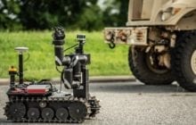 Testing ground robots performing military-style exercises