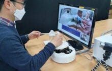 A remote specimen collection robot eliminates direct contact between medical personnel and patients