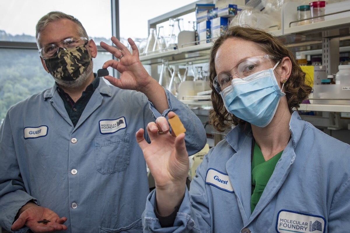 Berkeley Lab scientists Brett Helms (left) and Corinne Scown hold samples of PDK plastic, a unique new material that can be recycled indefinitely – a vast improvement over traditional plastics, of which less than 10% is recycled at all. Only a small fraction of that fraction is recycled more than once before the material is dumped. (Credit: Thor Swift/Berkeley Lab)