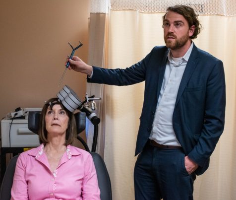 Nolan Williams demonstrates SAINT, the magnetic brain stimulation therapy he and his colleagues developed, on Deirdre Lehman, a participant in a previous study of the treatment.
Steve Fisch