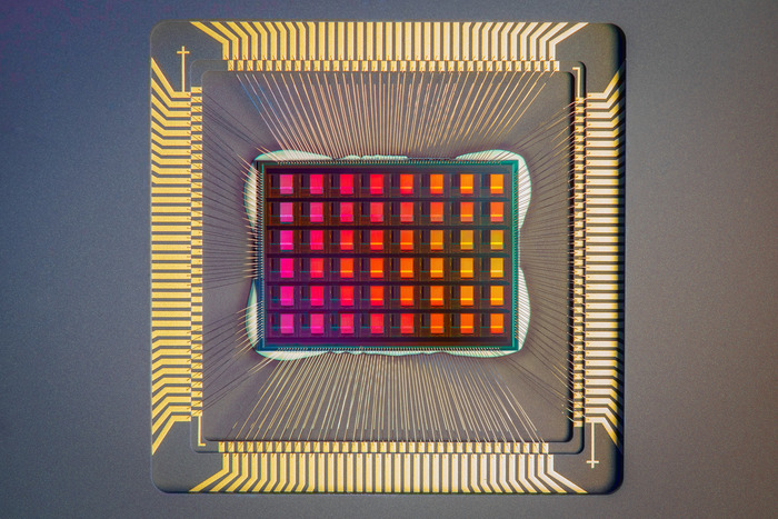 The NeuRRAM chip is not only twice as energy efficient as state-of-the-art, it’s also versatile and delivers results that are just as accurate as conventional digital chips. (Image credit: David Baillot/University of California San Diego.)