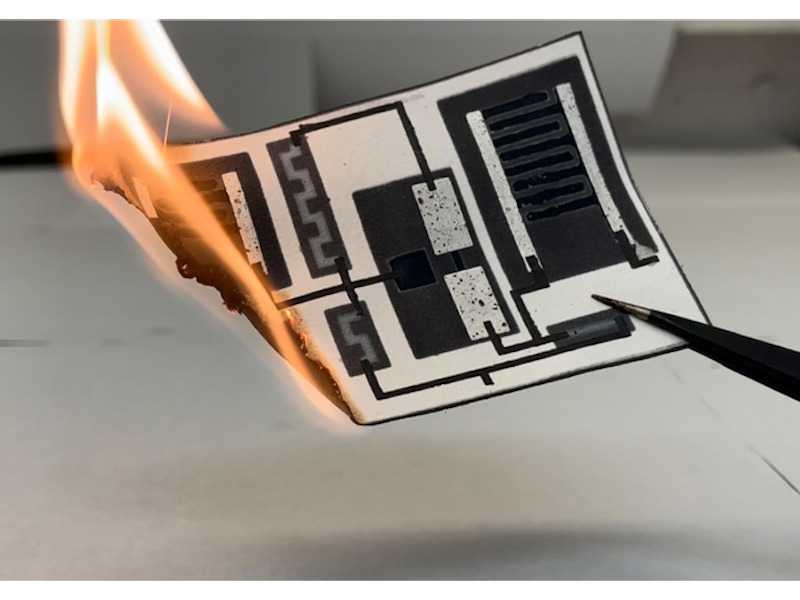 An electronic circuit printed on paper could be a more flexible and disposable option for single-use electronics. Credit: Adapted from ACS Applied Materials & Interfaces 2022, DOI: 10.1021/acsami.2c13503