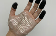 Virtualizing the sense of touch enables high-fidelity tactile perception for those wearing thick protective suits or gloves