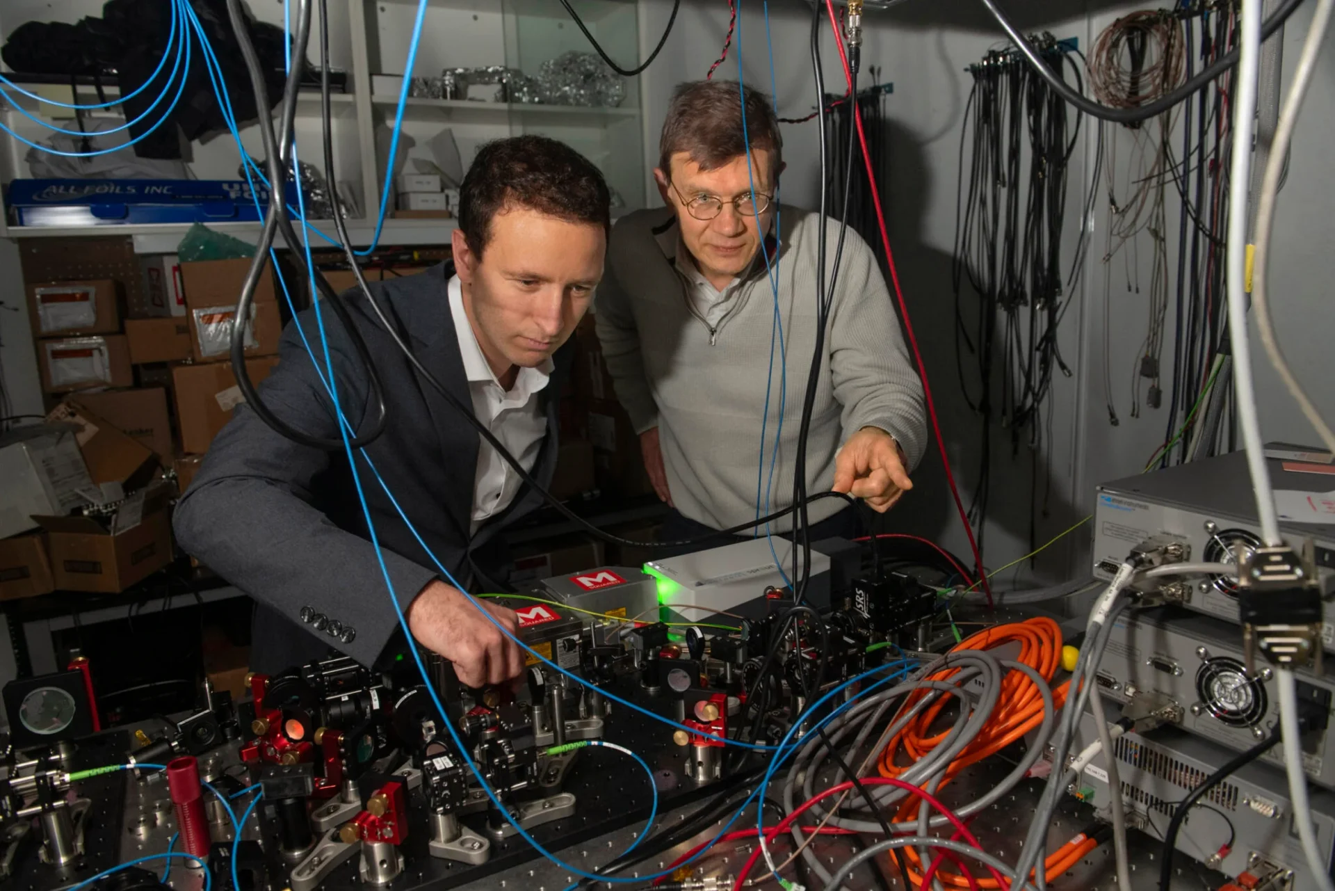 A team led by quantum expert Mikhail Lukin (right) has achieved a breakthrough in quantum computing. Dolev Bluvstein, a Ph.D. student in Lukin’s lab, was first author on the paper. Jon Chase/Harvard Staff Photographer
